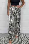 Women's Shiny animal print trousers Fashion Trends